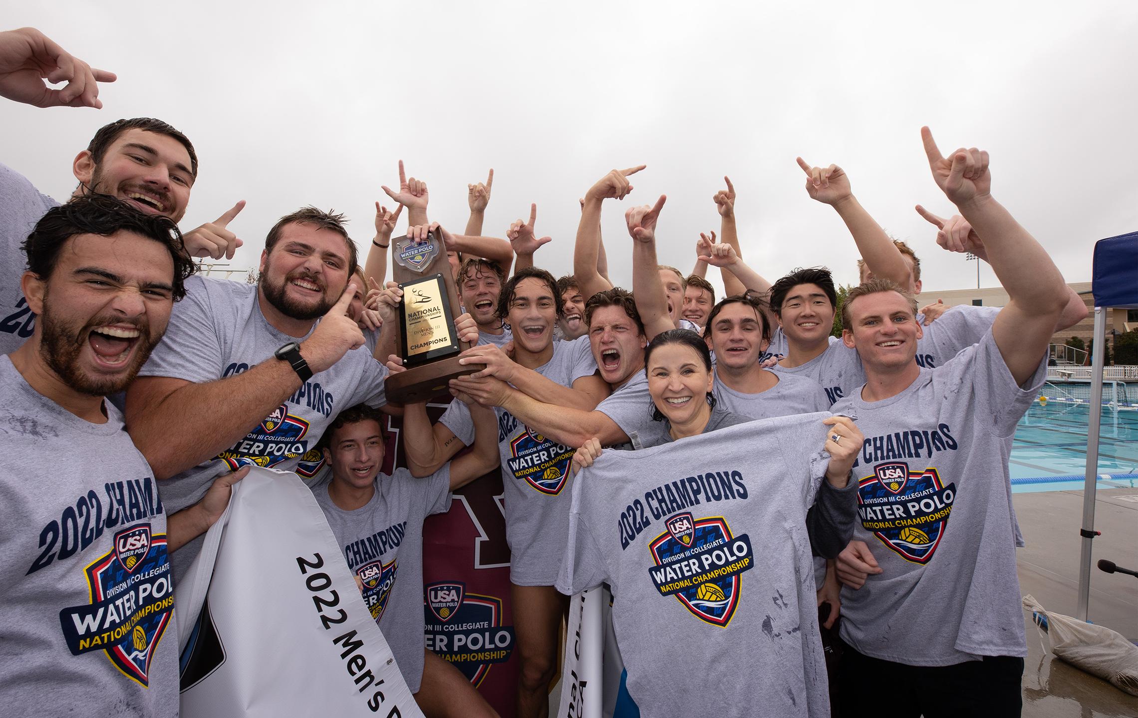 a group of people holding a trophy