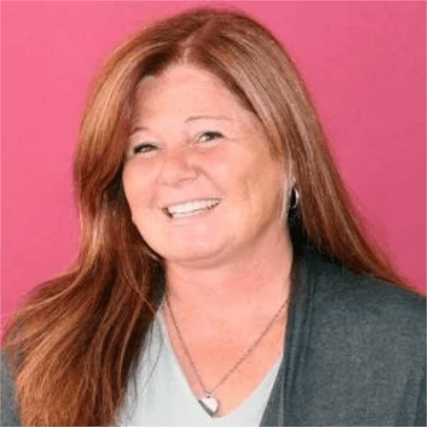 a woman smiling at the camera