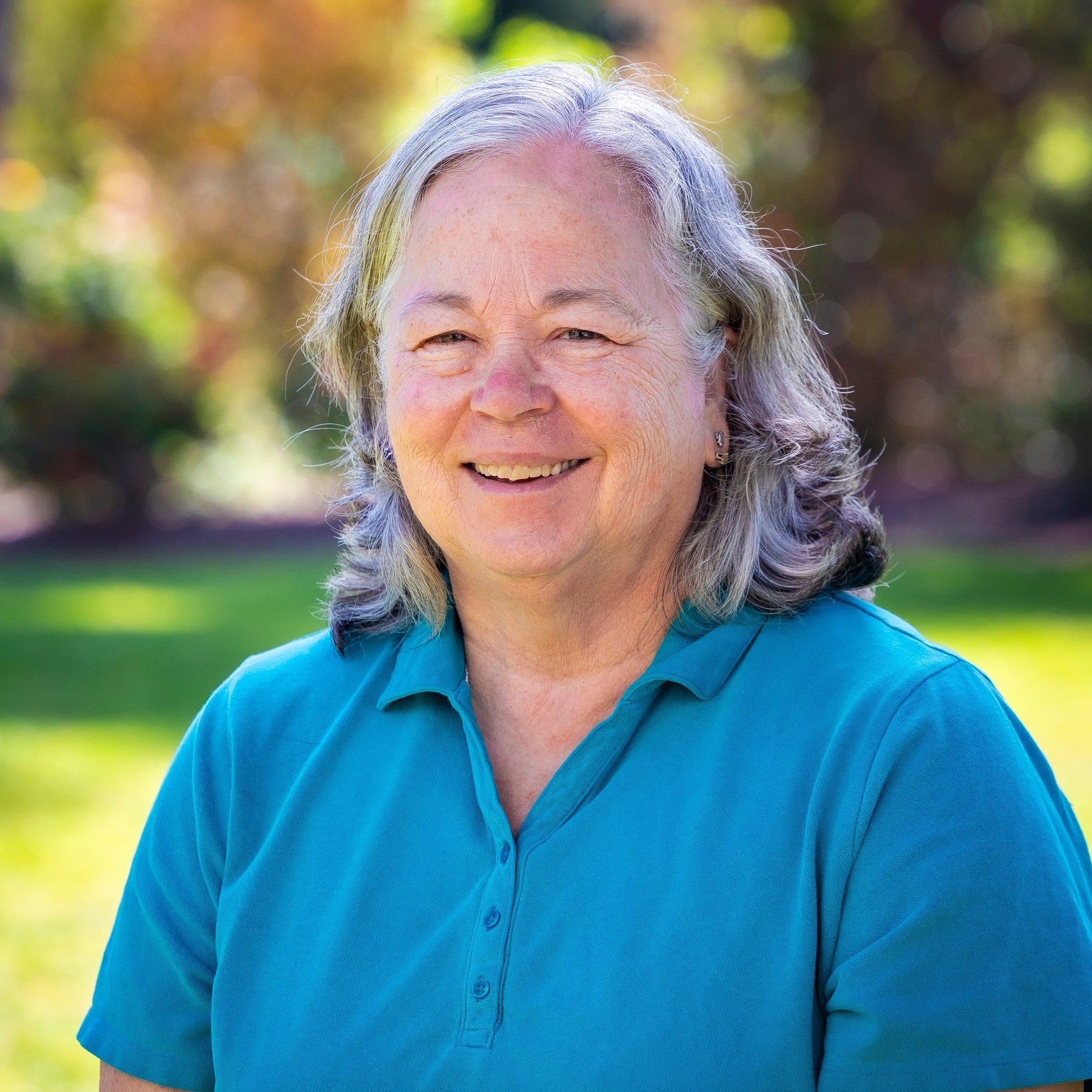 a woman in a blue shirt