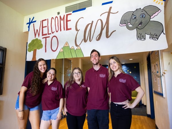 a group of people posing for a photo