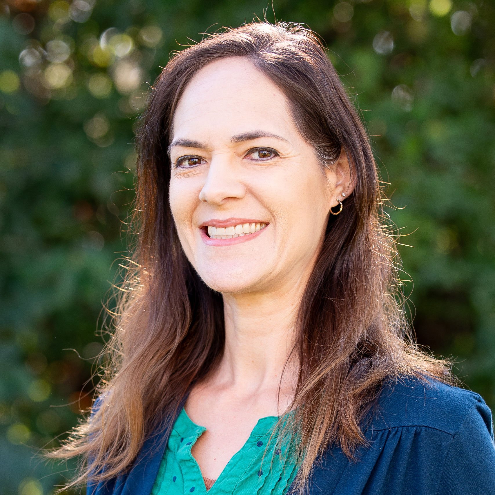 a woman smiling for a picture