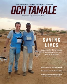 two men standing in a desert