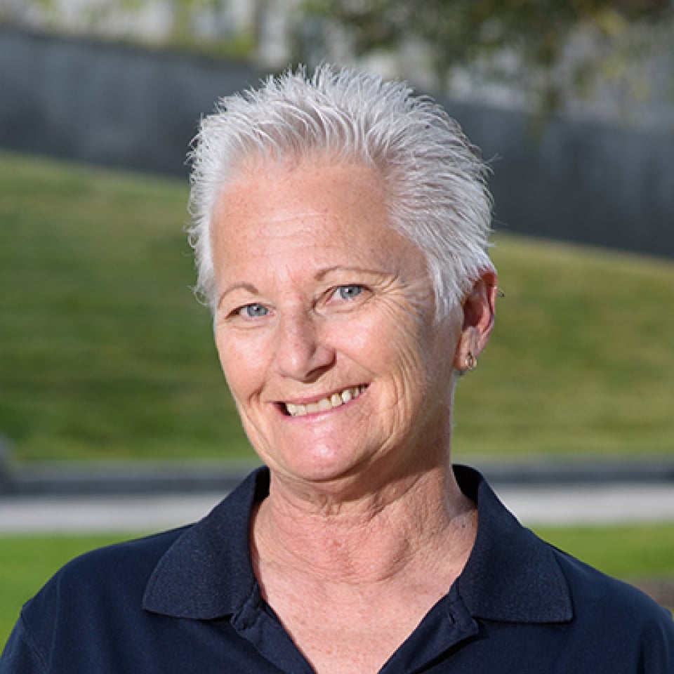 a woman smiling at camera