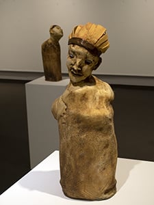a sculpture of a woman