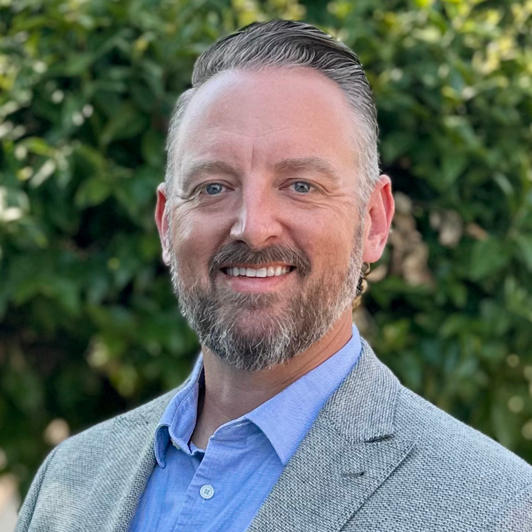 a man smiling for a picture