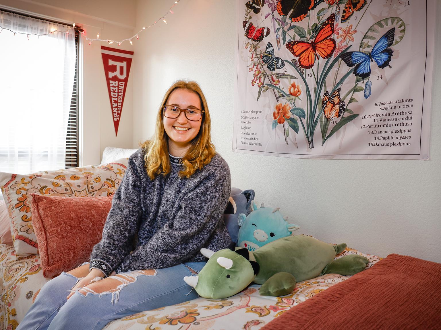 a woman sitting on a couch