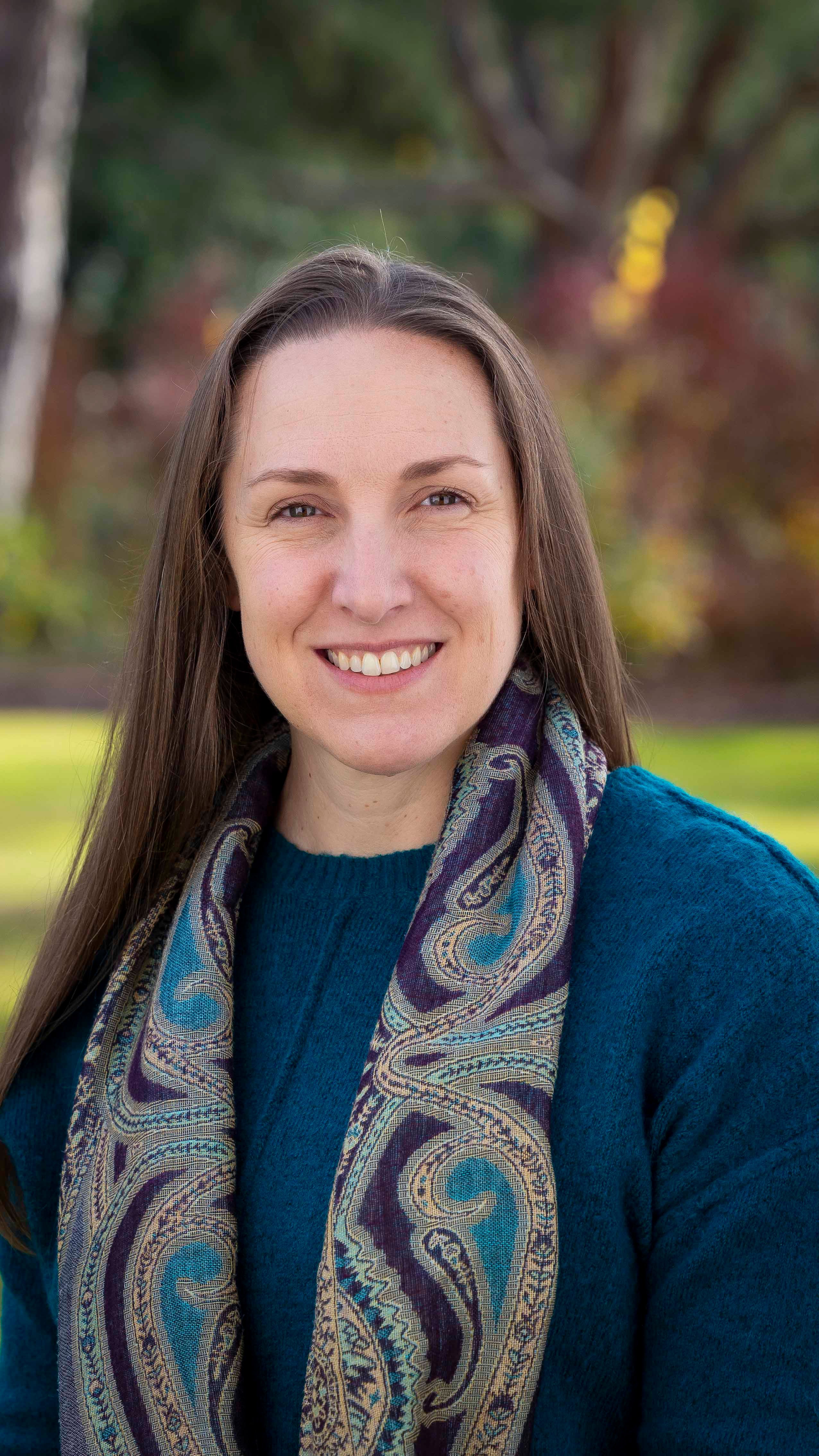 a woman smiling for a picture
