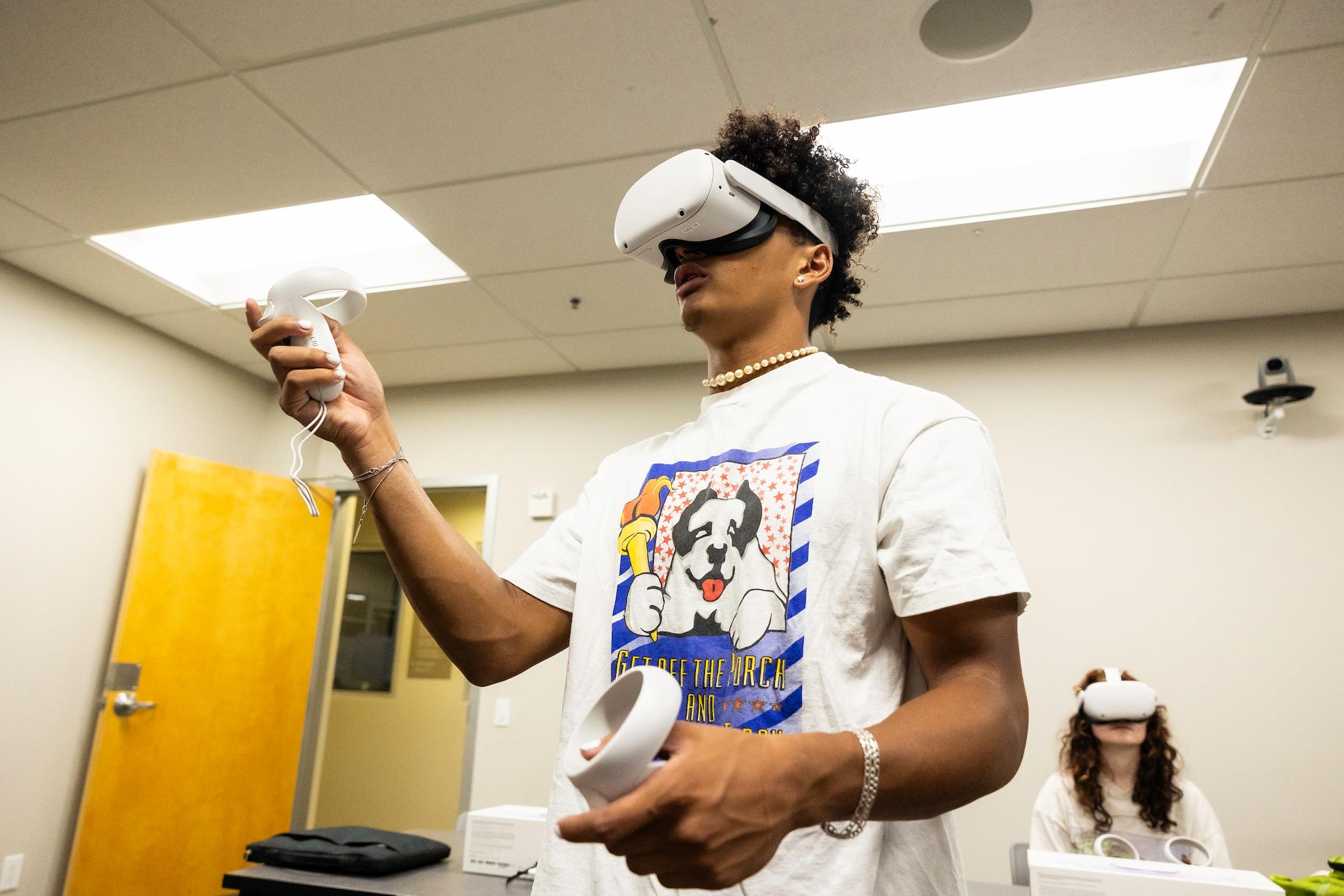 a man wearing virtual reality goggles