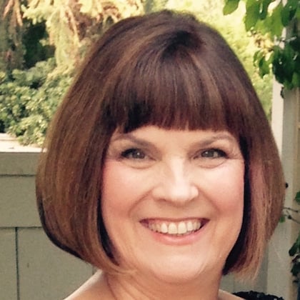 a person smiling at the camera