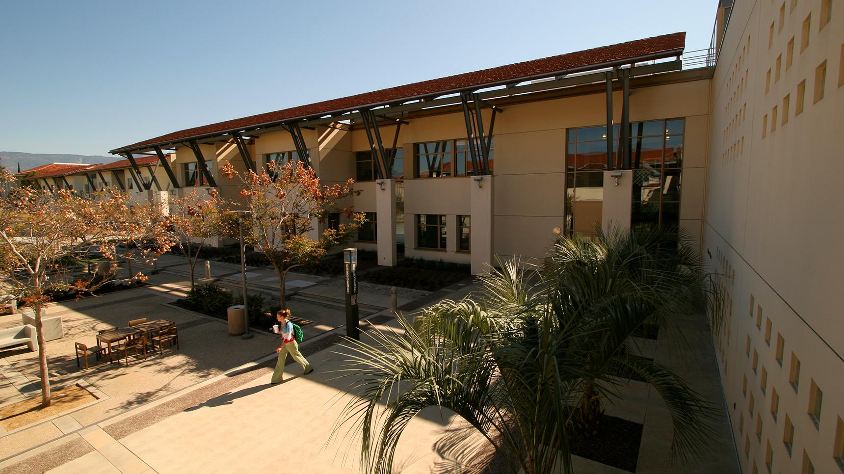 a person walking down a sidewalk