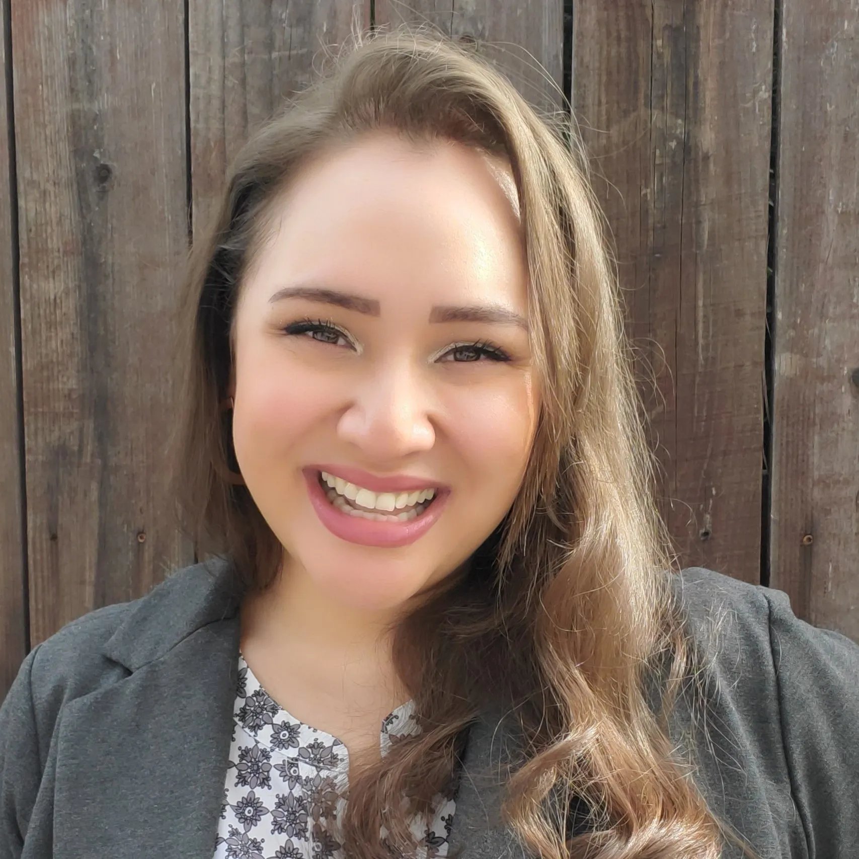 a woman smiling at camera