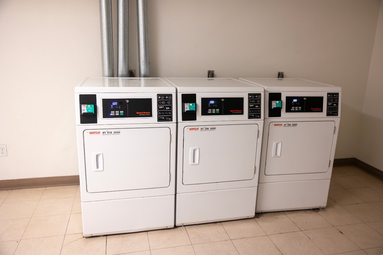 a group of white washing machines
