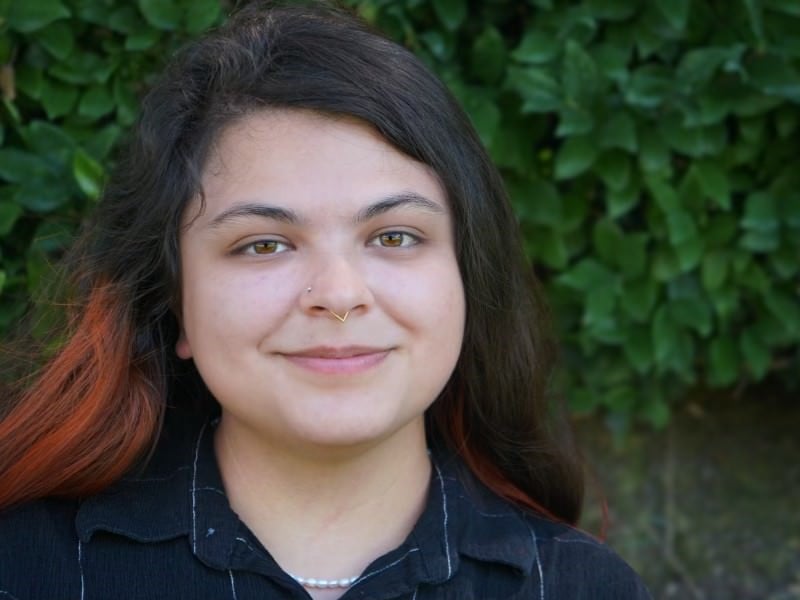 a woman with a nose ring