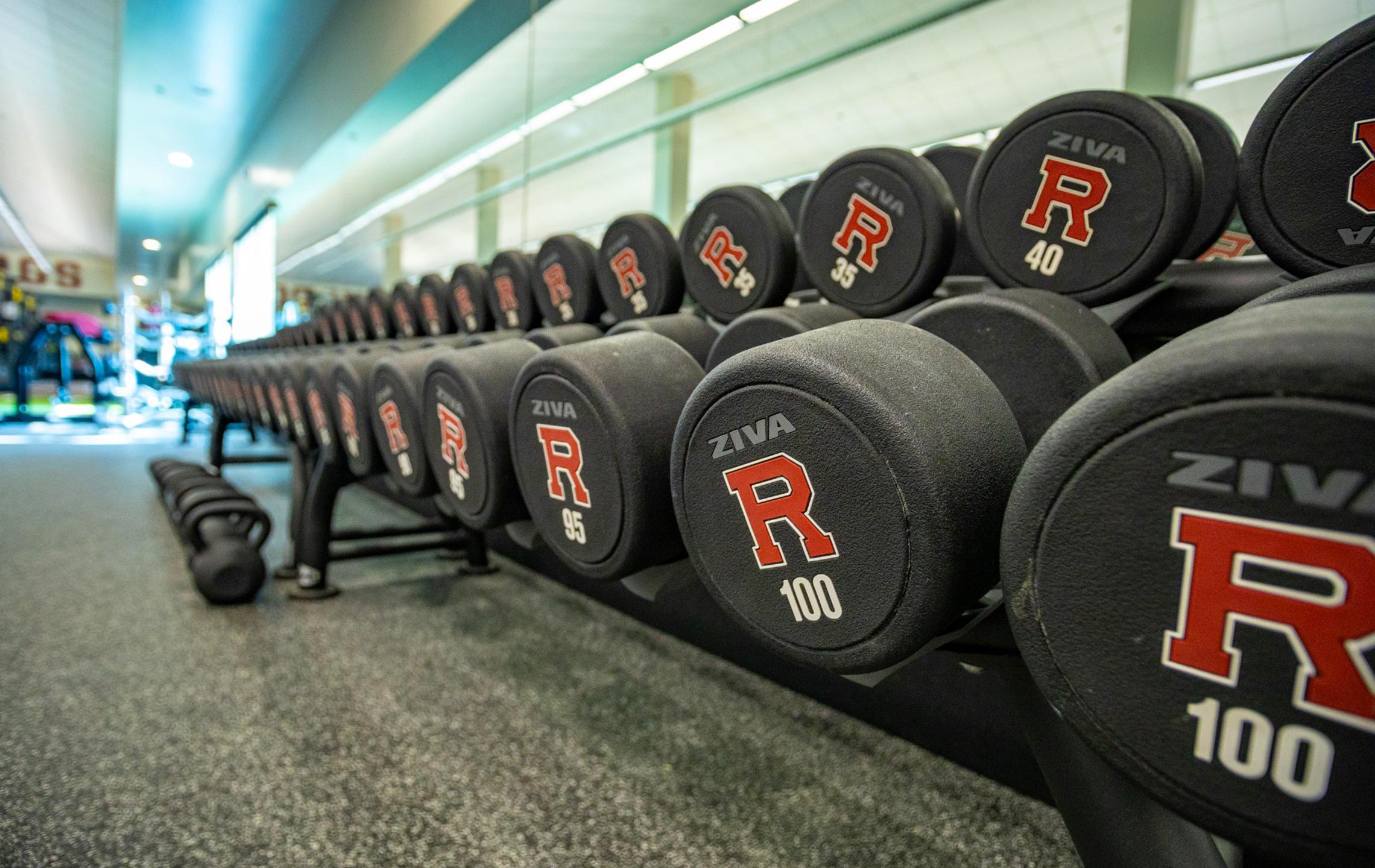 a row of weights in a gym