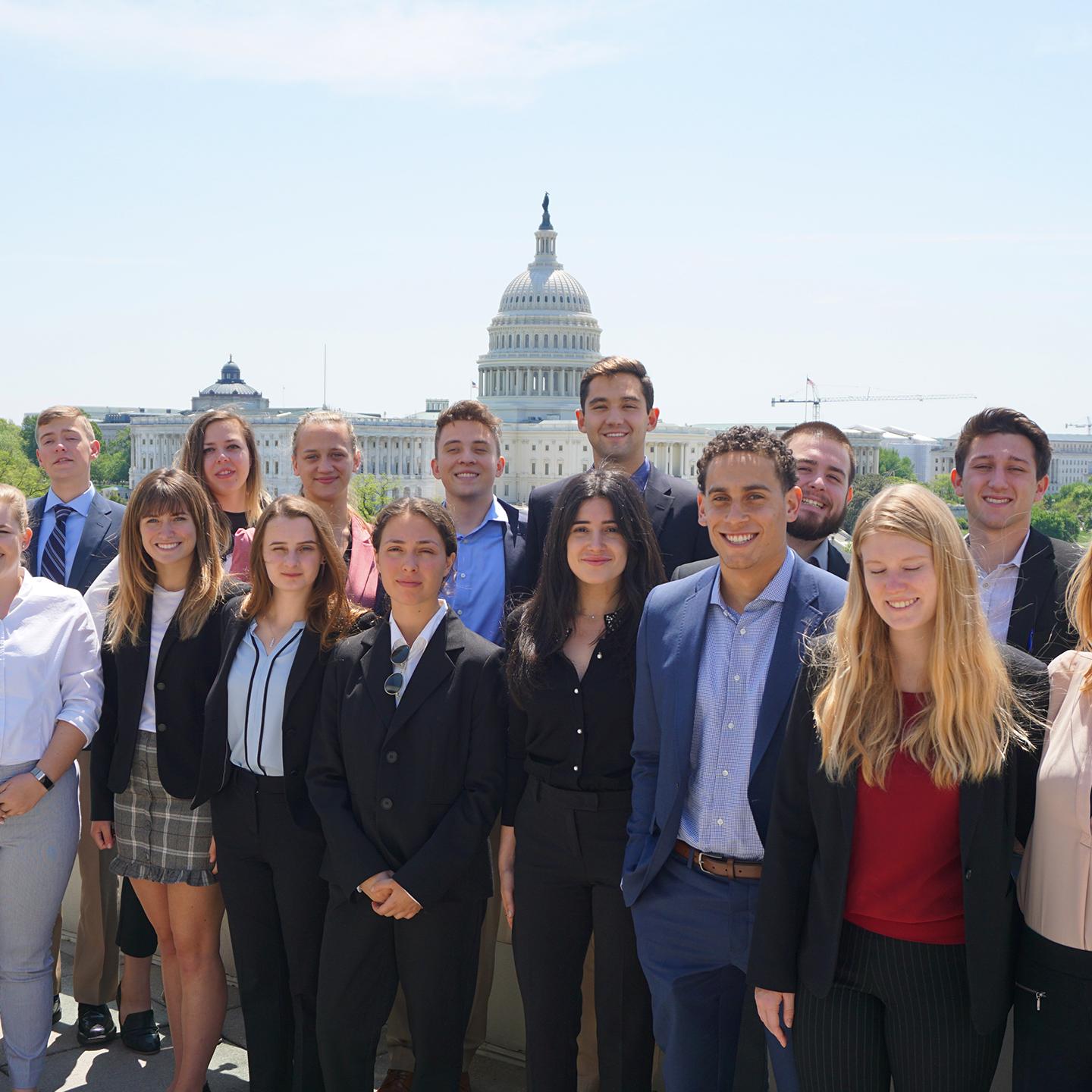 a group of people posing for a photo
