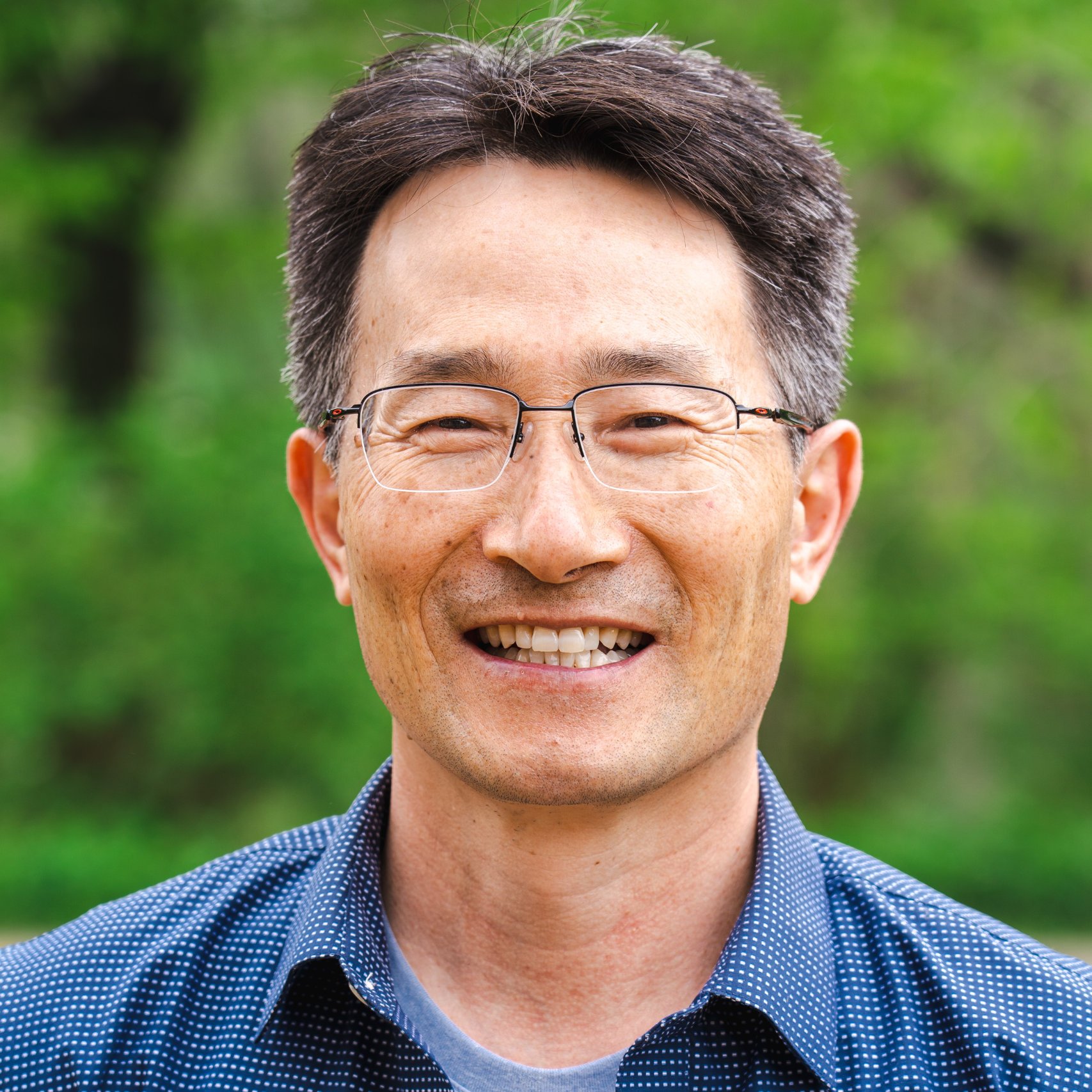 a man smiling for a picture