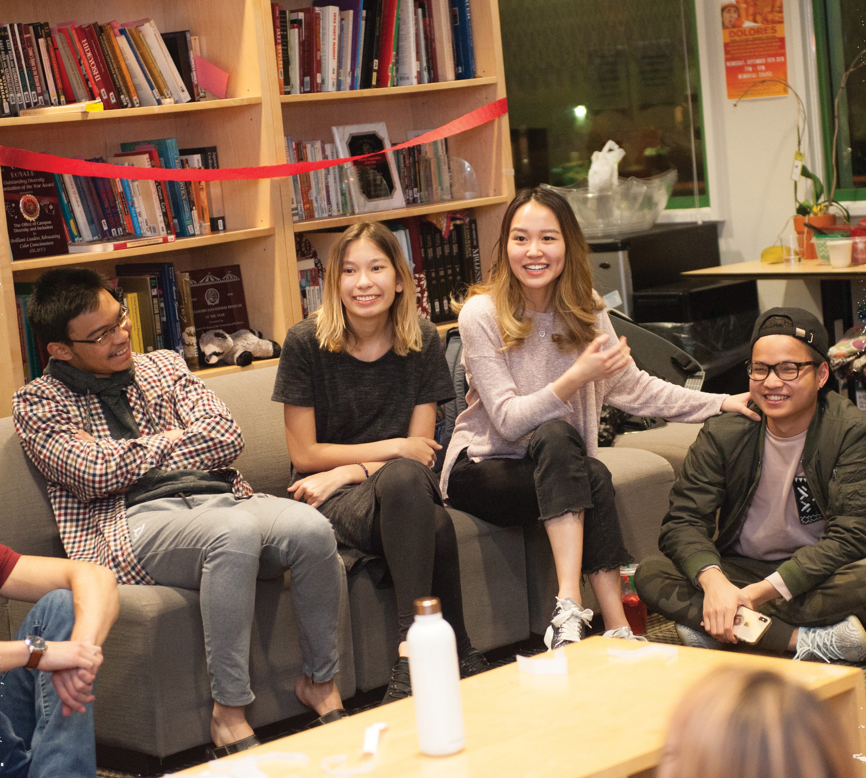 a group of people sitting on couches