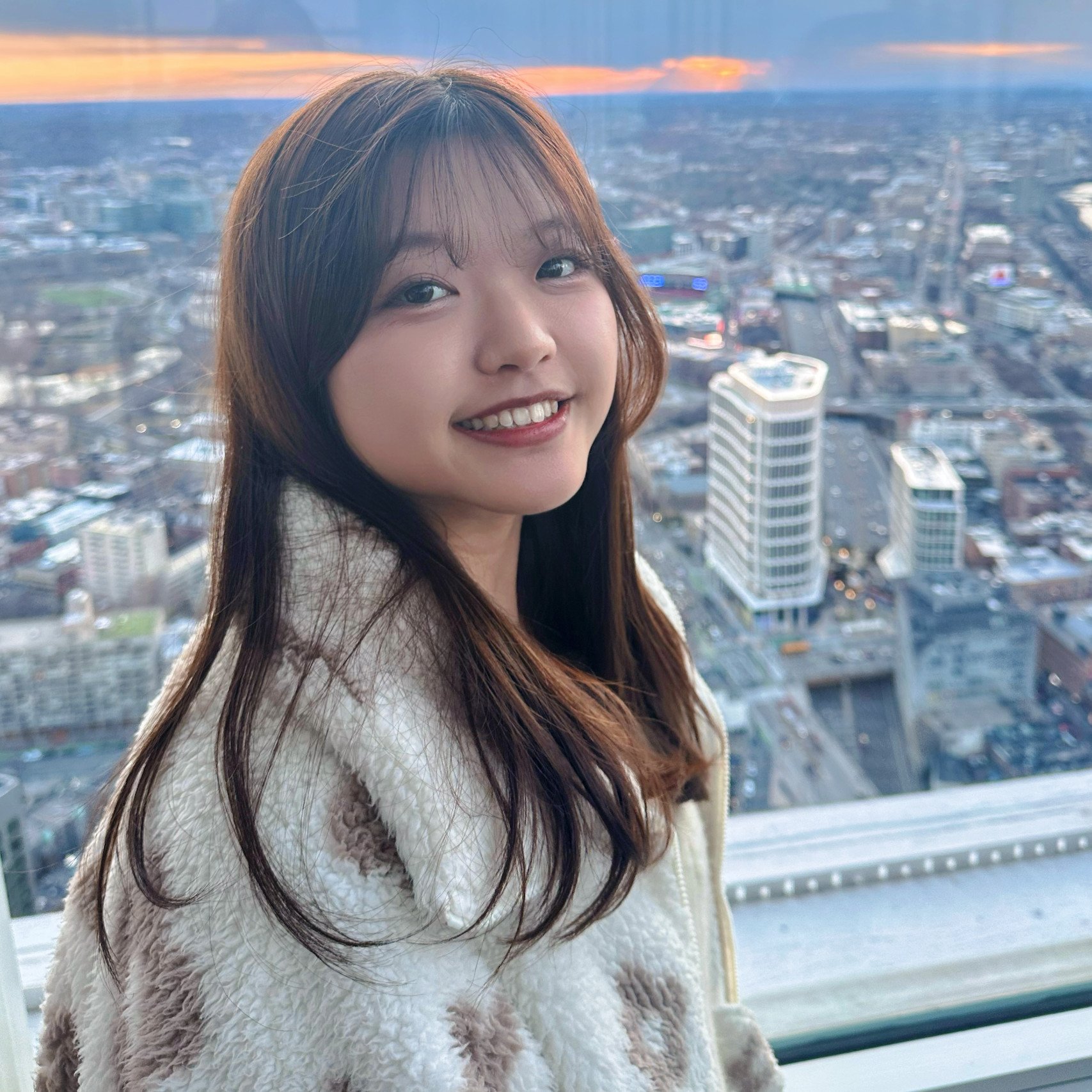 a woman smiling at the camera