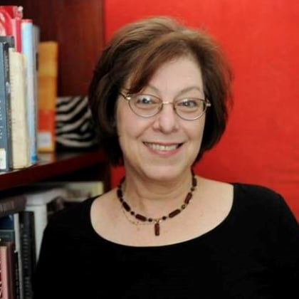 a woman smiling at camera