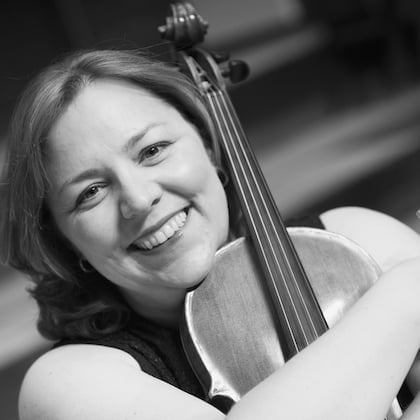 a person holding a violin