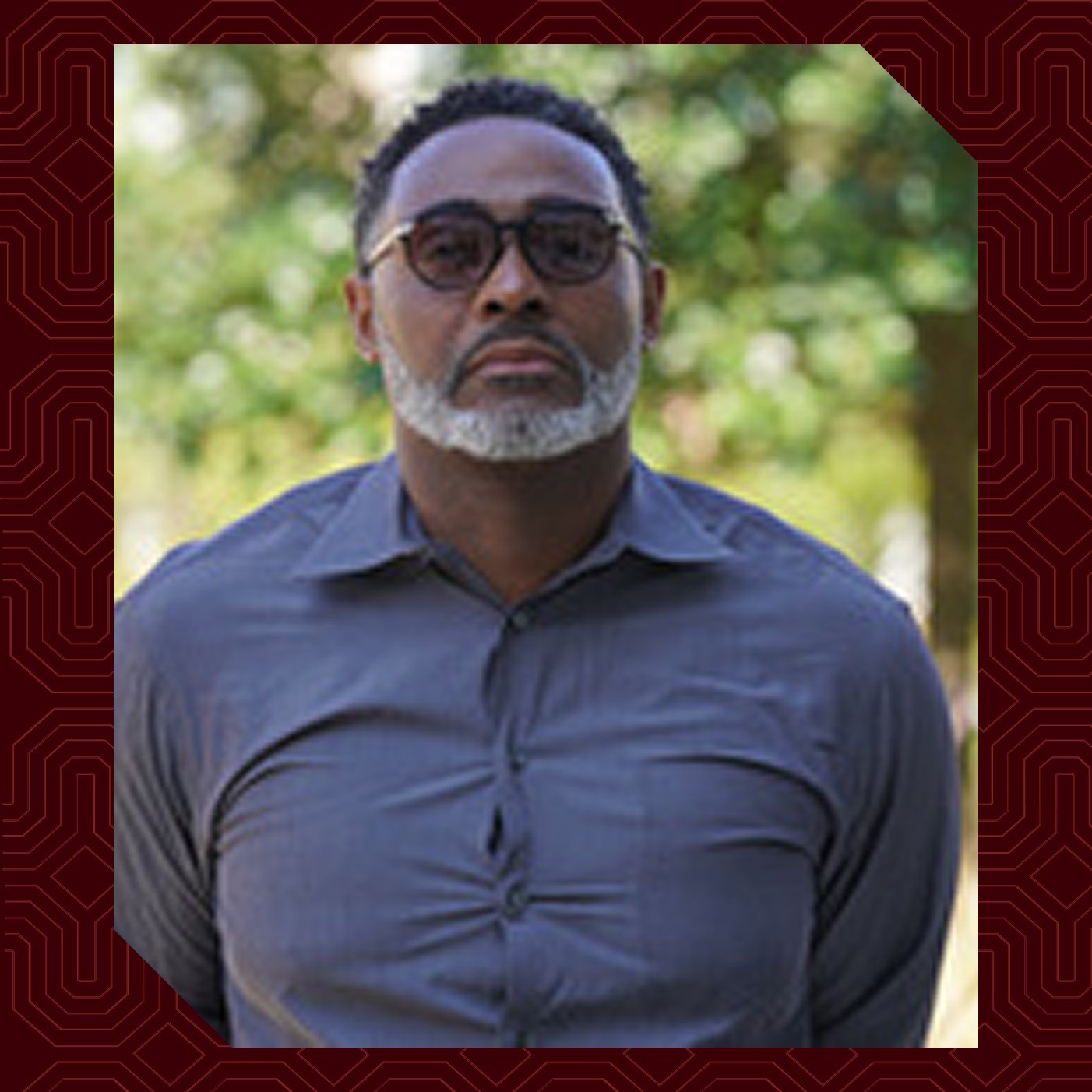 a man with glasses and a beard