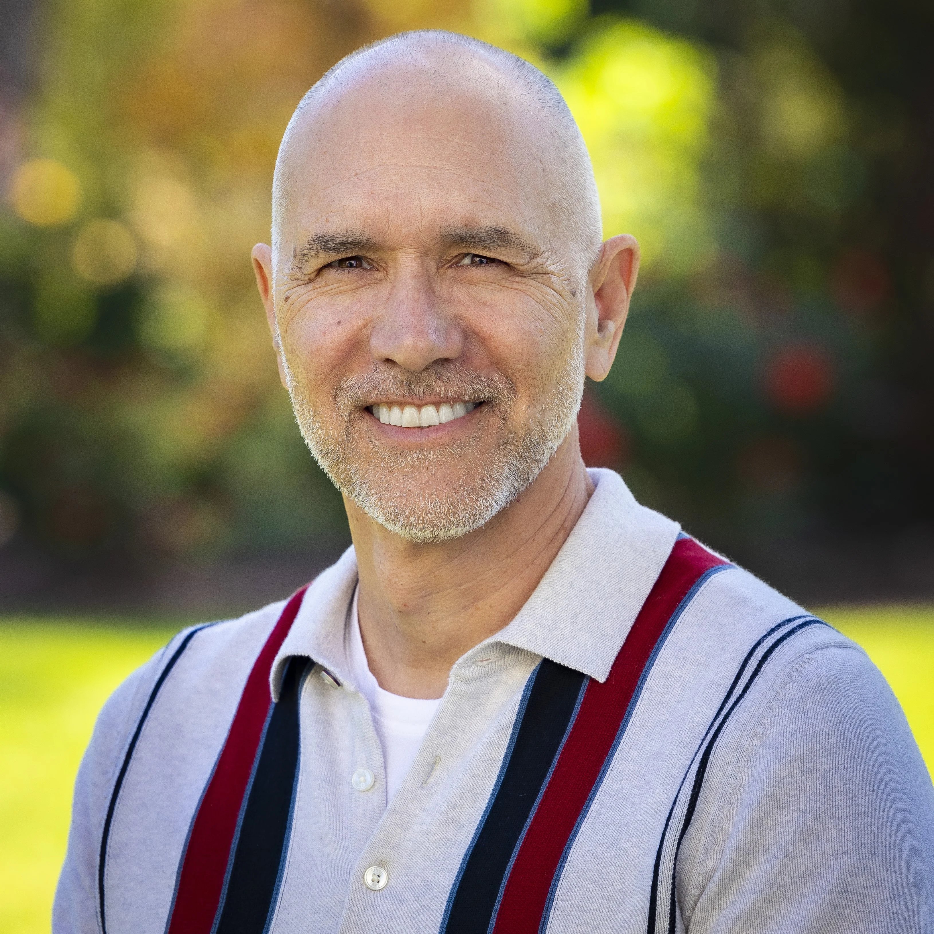 a man smiling for the camera