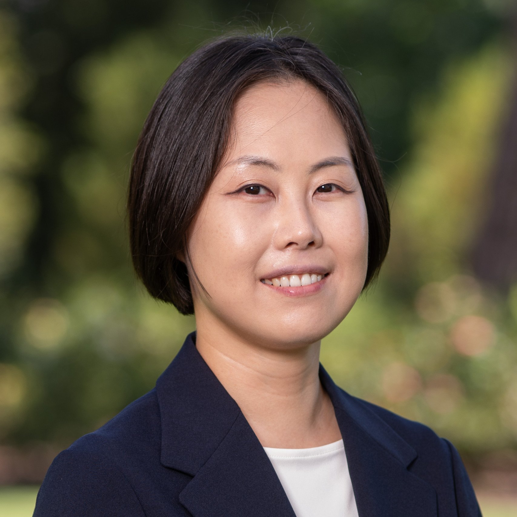 a woman smiling at the camera