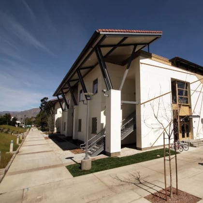 a building with a walkway and a bike
