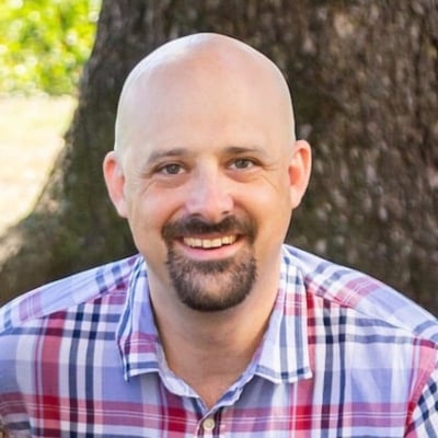 a man smiling for the camera