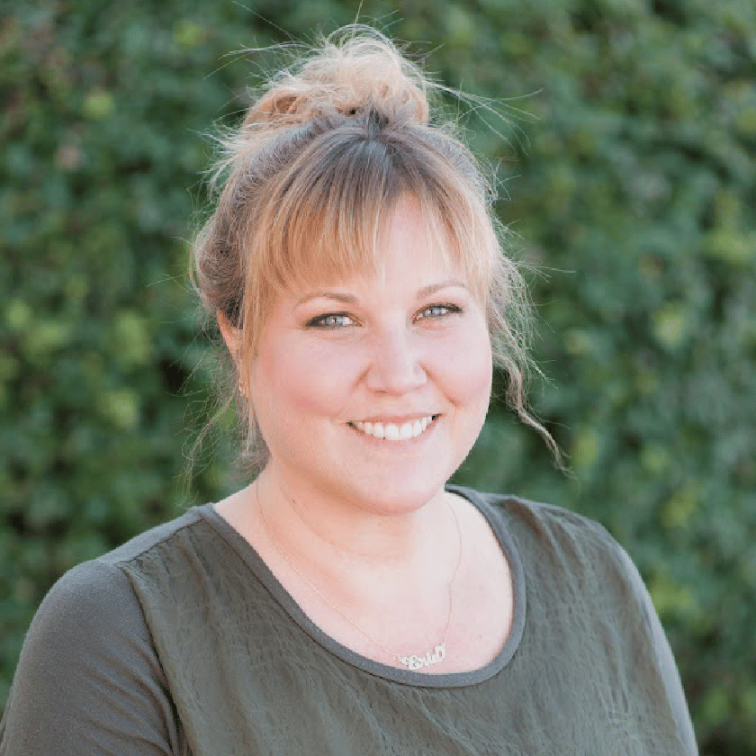 a woman smiling at camera