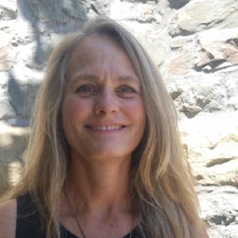 a woman smiling for a picture