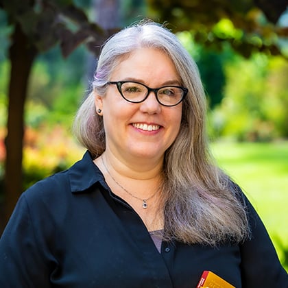 a woman smiling at camera