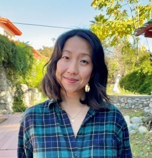 a woman smiling at the camera