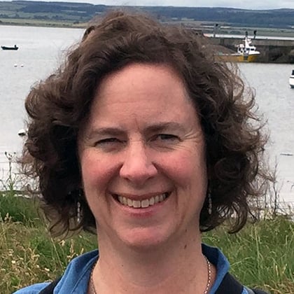 a woman smiling at camera