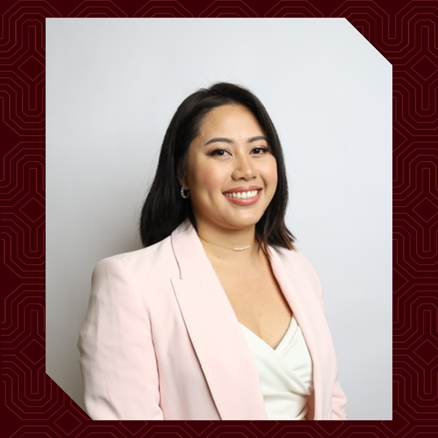 a woman in a pink jacket