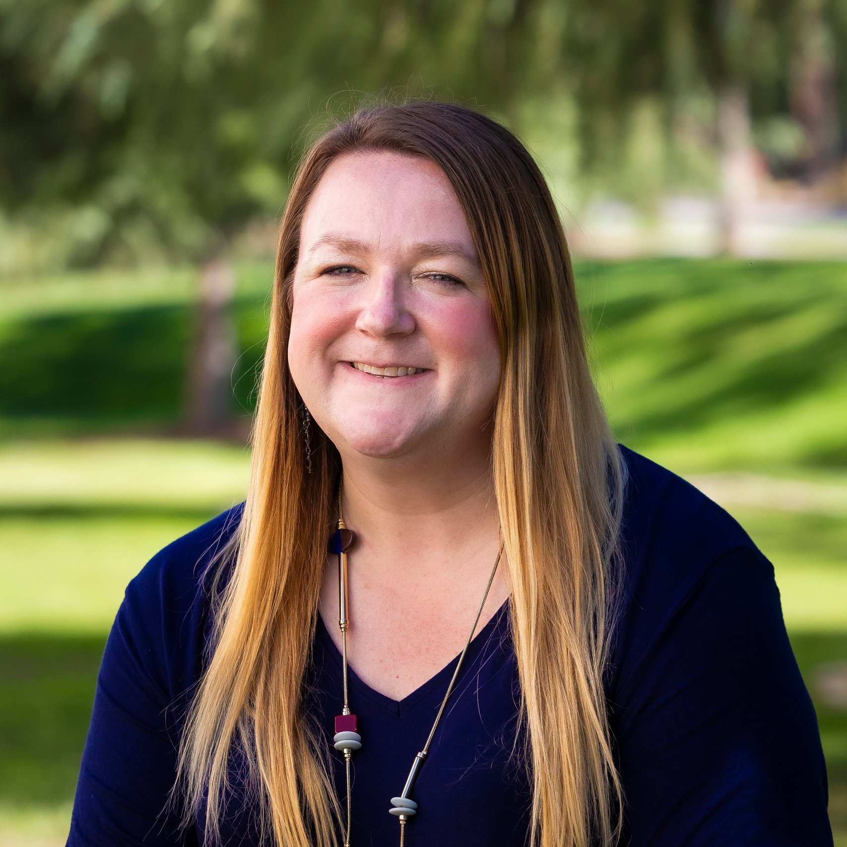 a woman smiling at camera