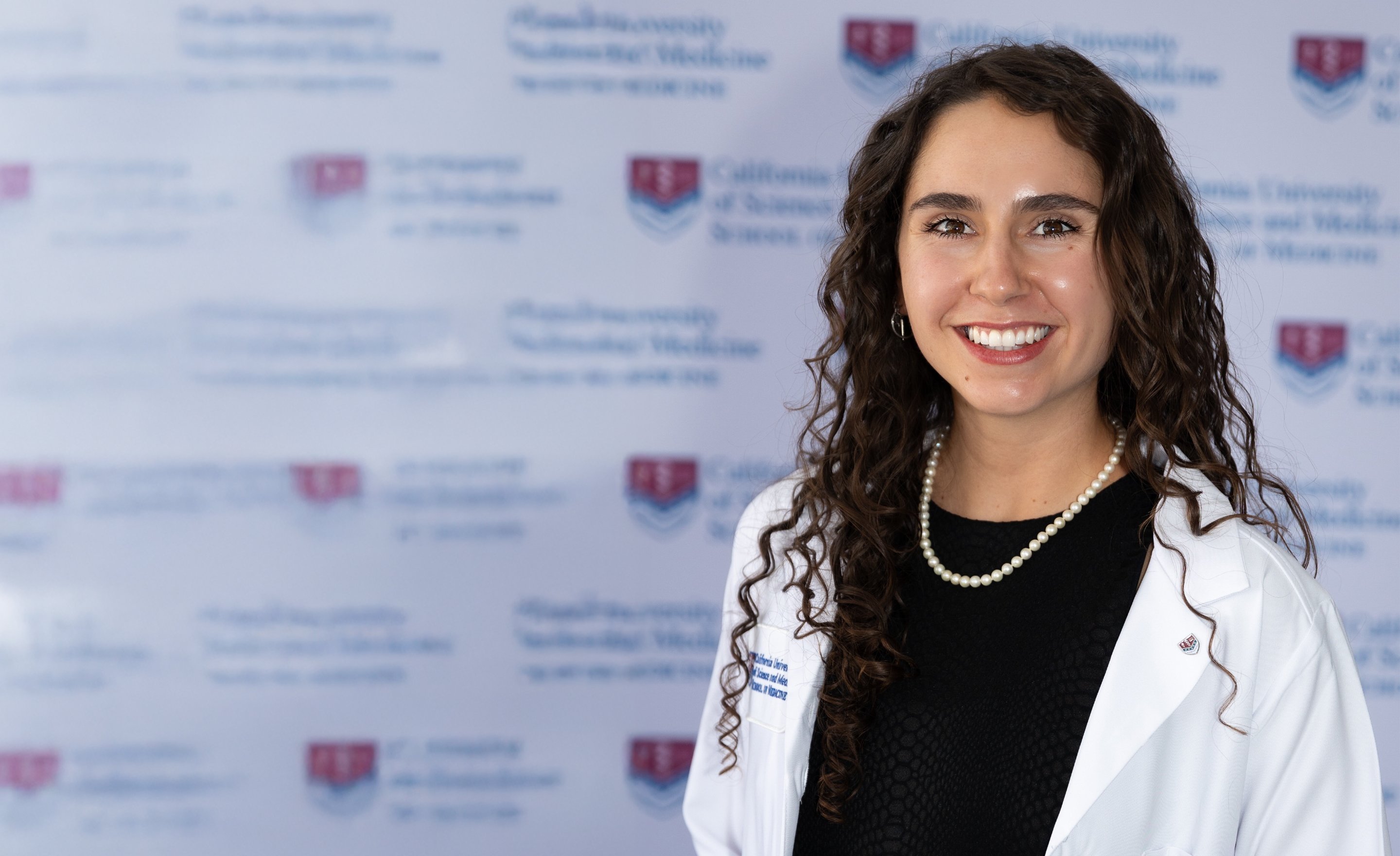 a woman smiling for a picture