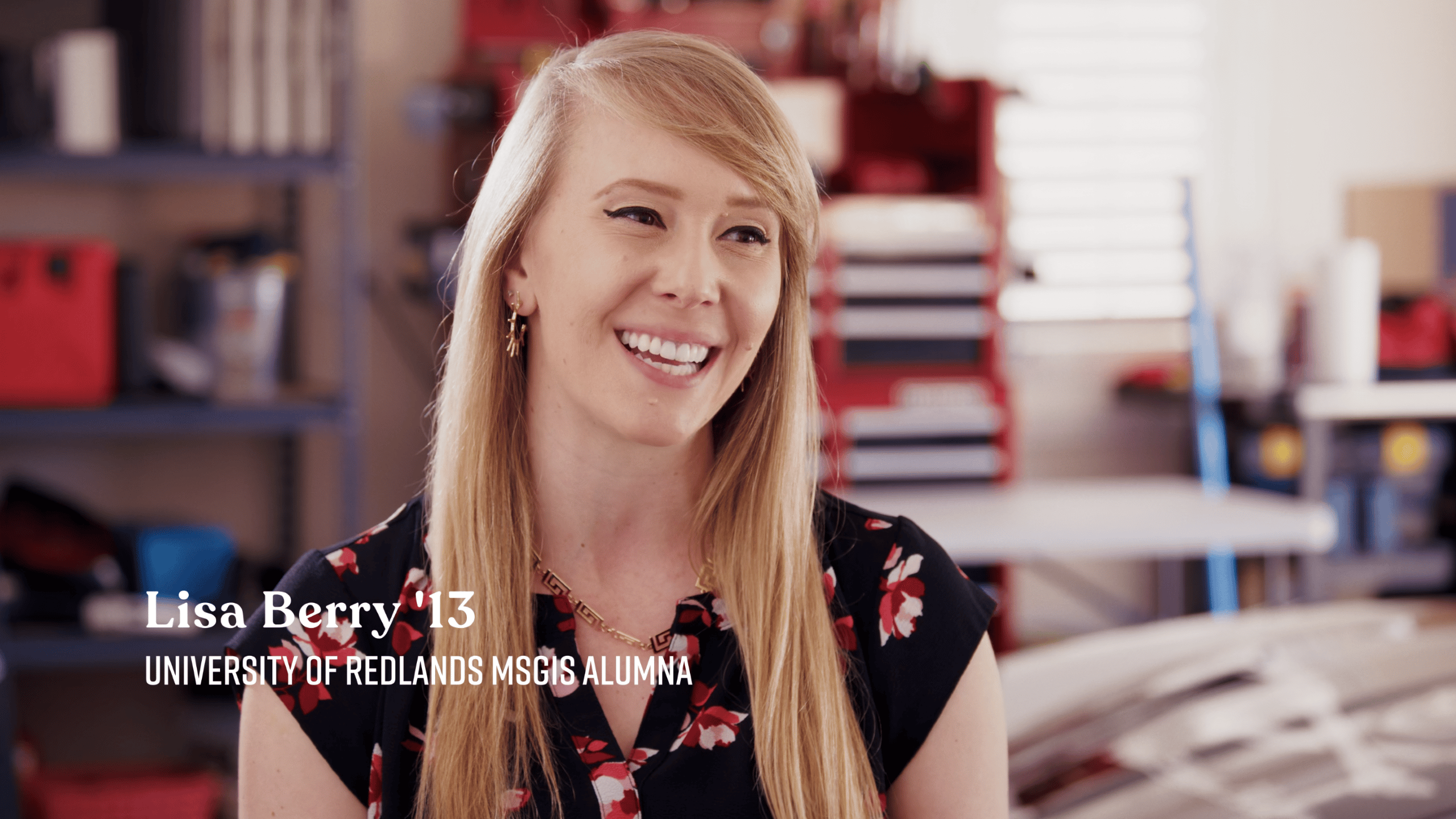 a woman smiling with blonde hair
