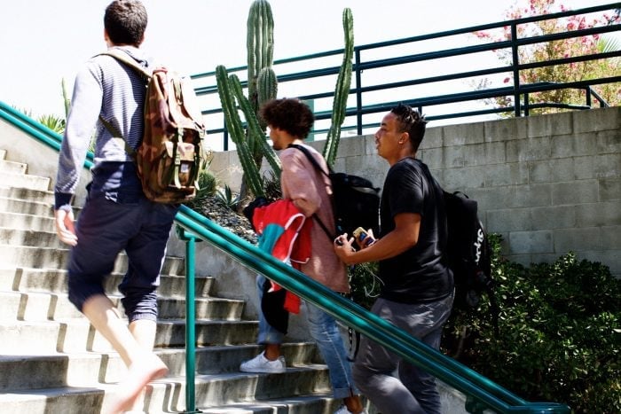 a group of people walking up stairs
