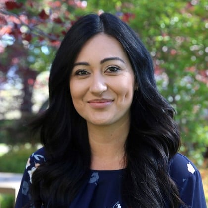a woman smiling at camera