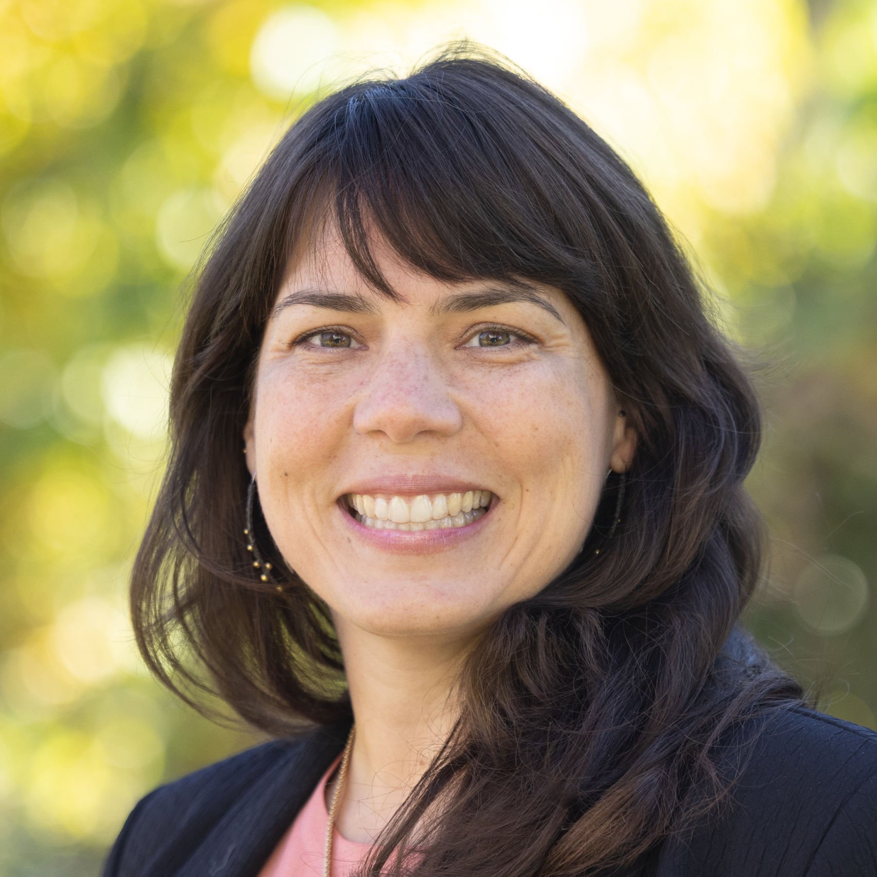 a woman smiling for a picture