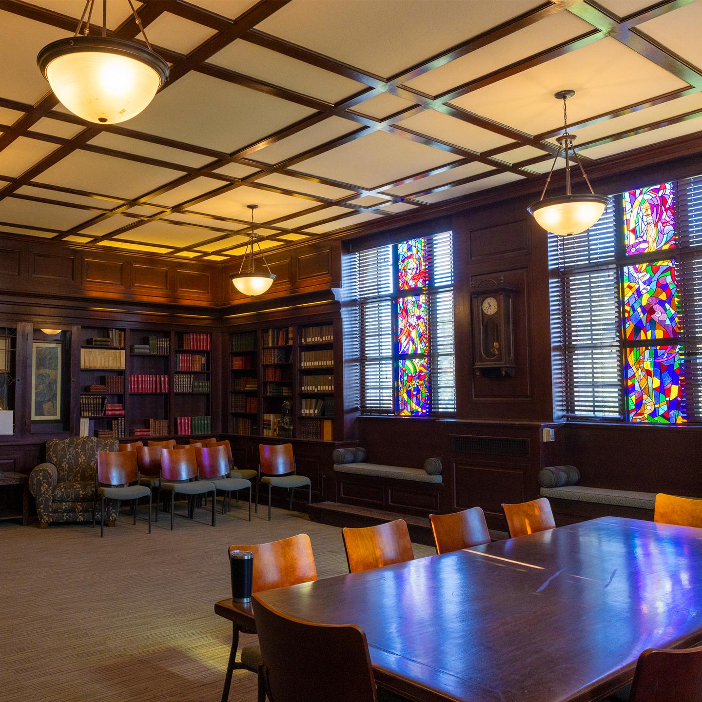 a room with a table and chairs