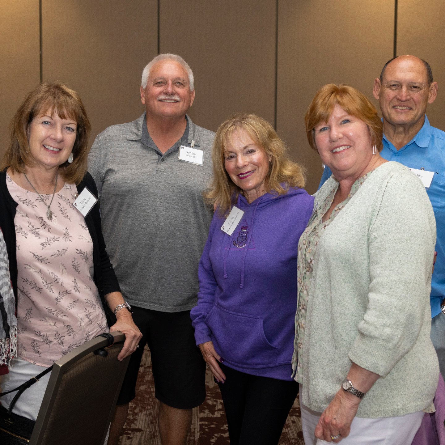 a group of people posing for a photo