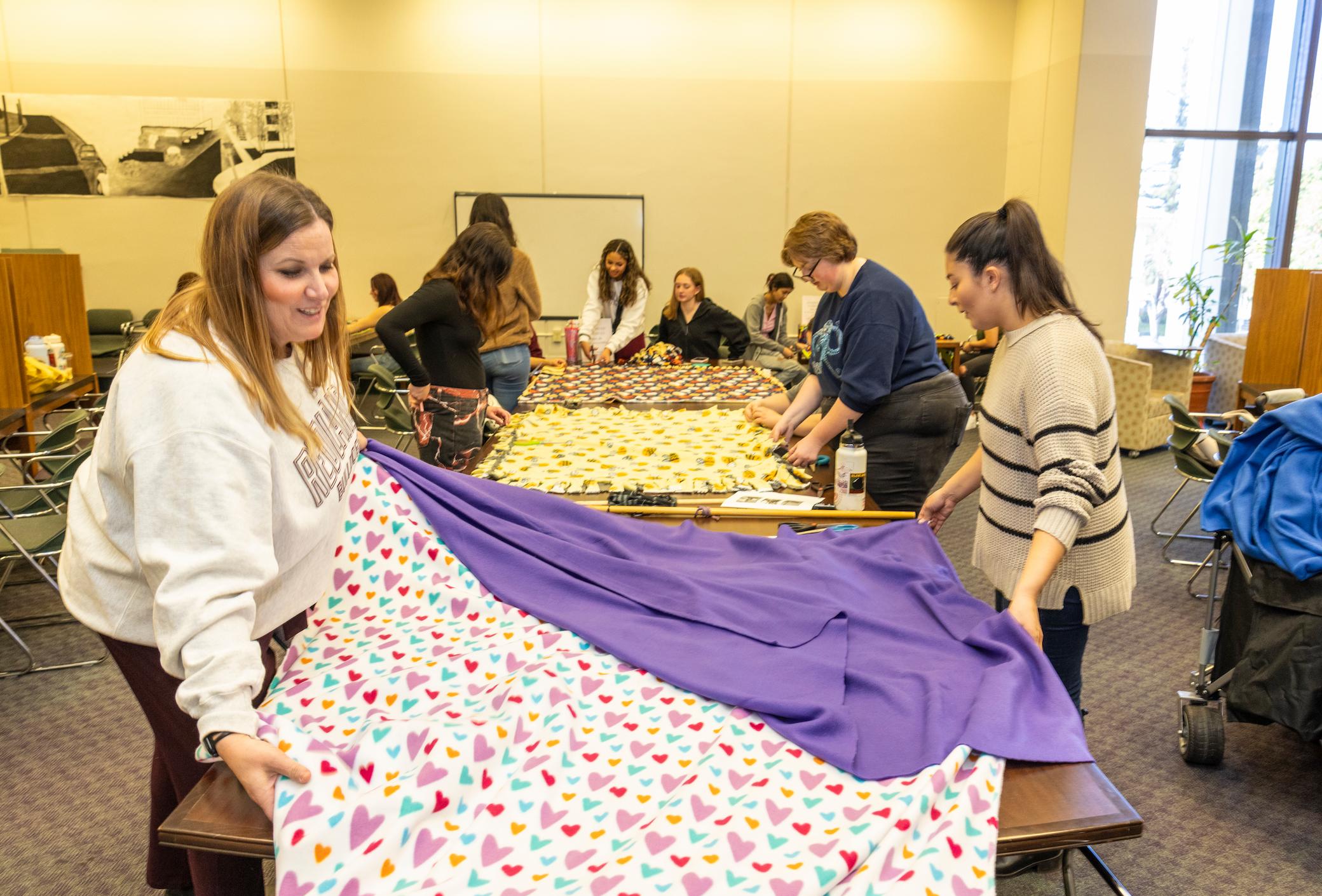 a group of people working on a table