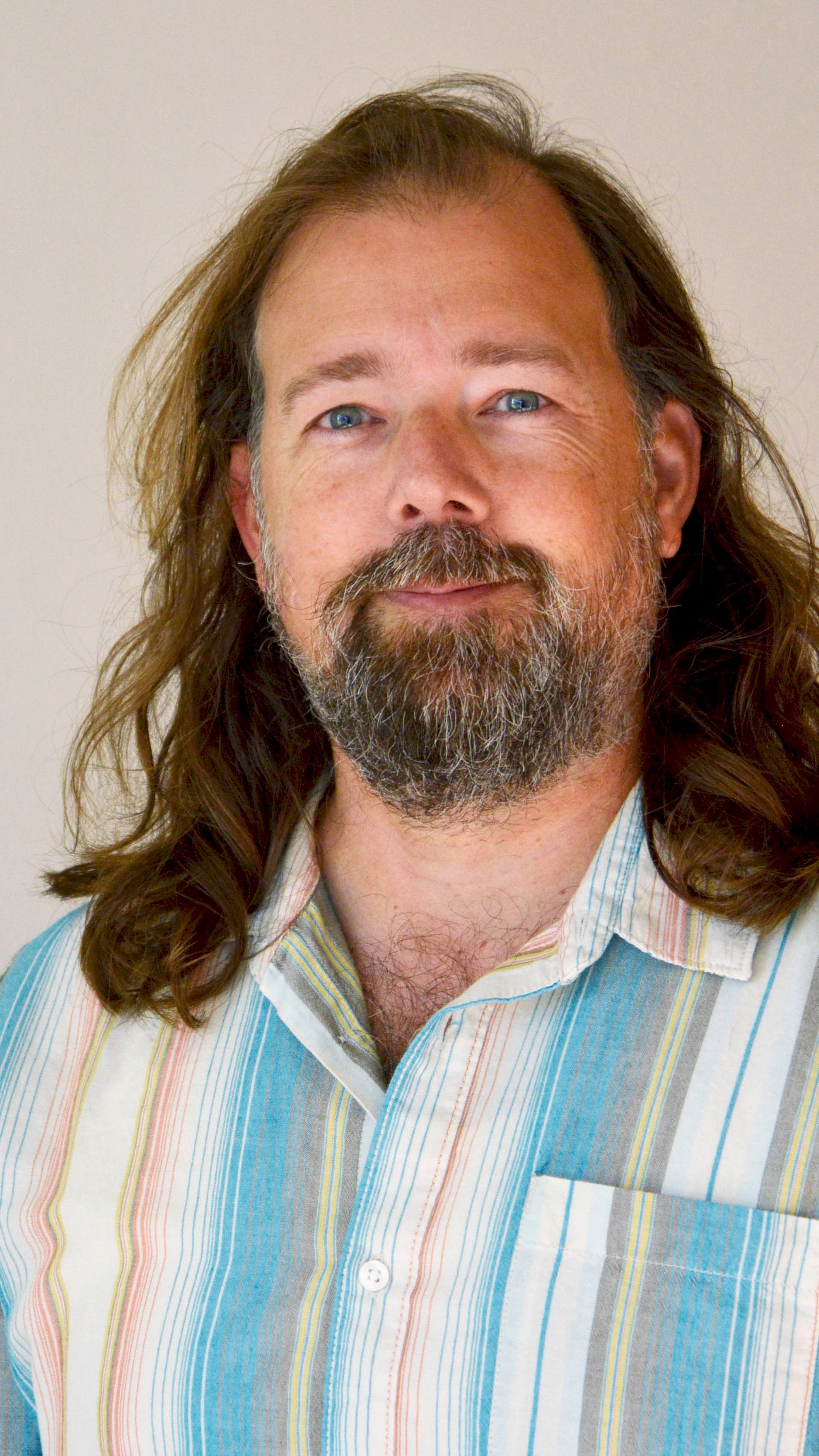 a man with long hair and beard