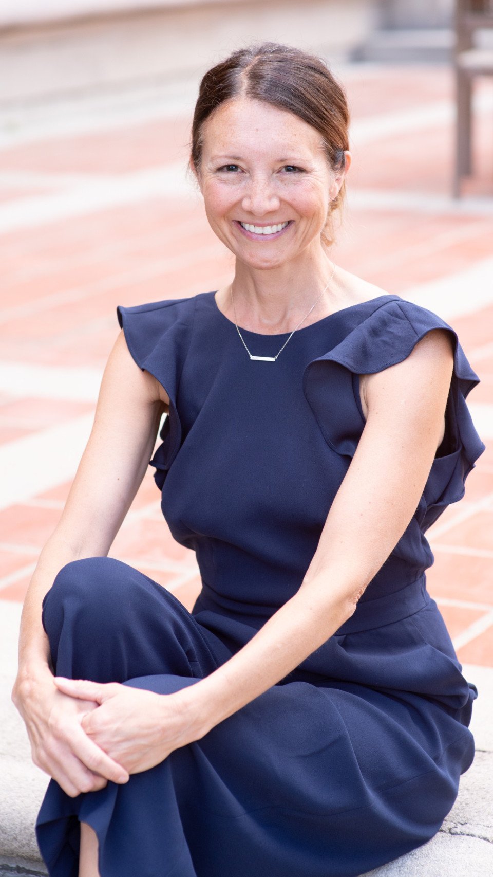 a woman in a blue dress