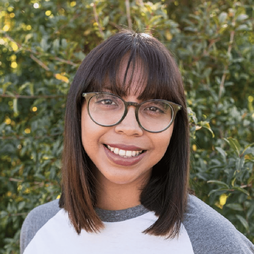 a woman smiling at camera