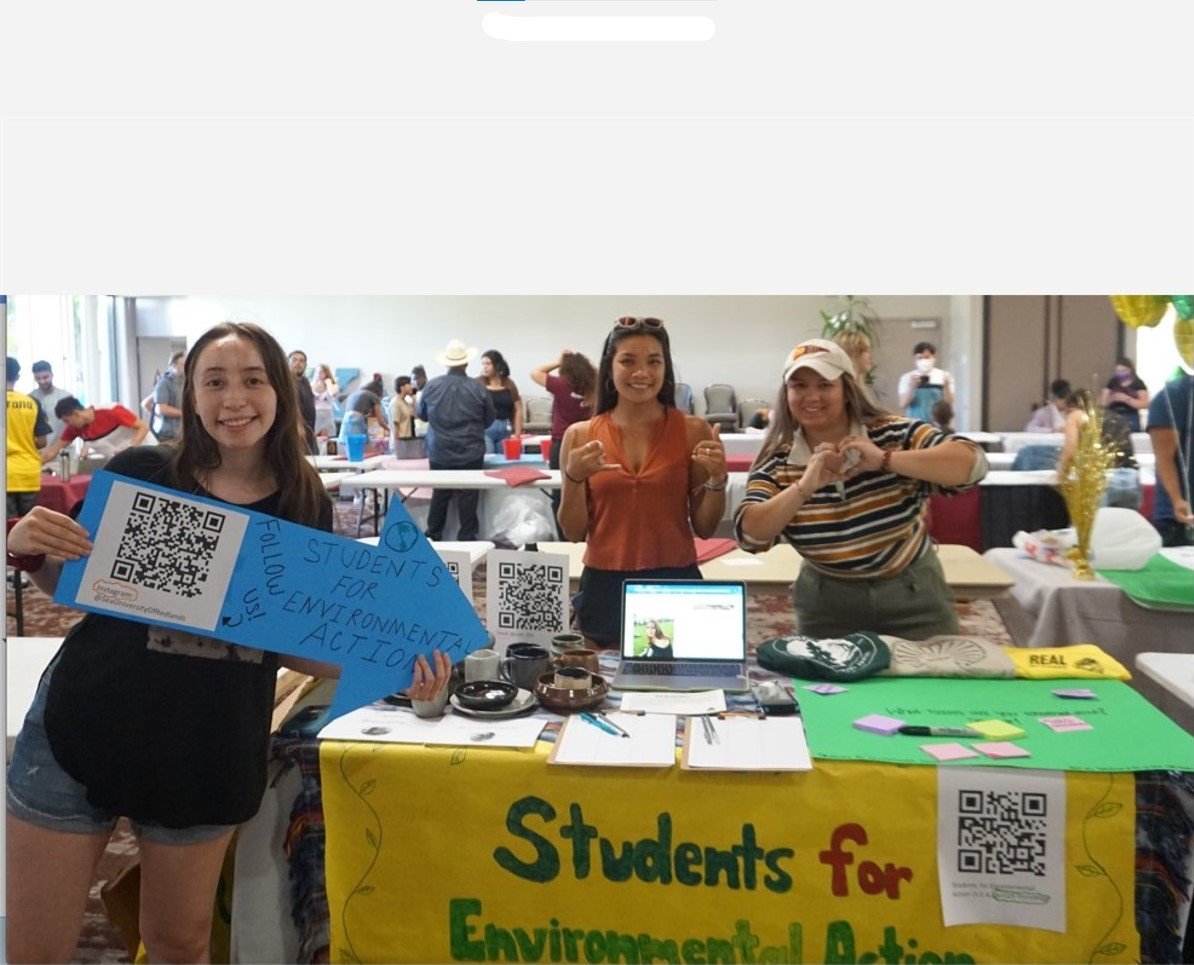 a group of women standing at a table