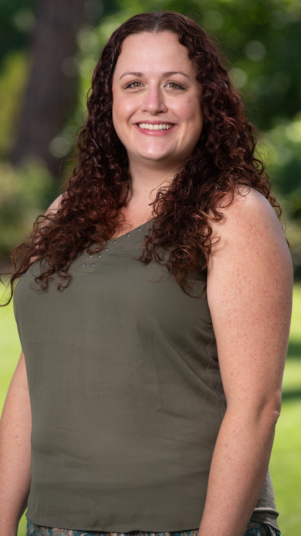 a woman smiling at camera