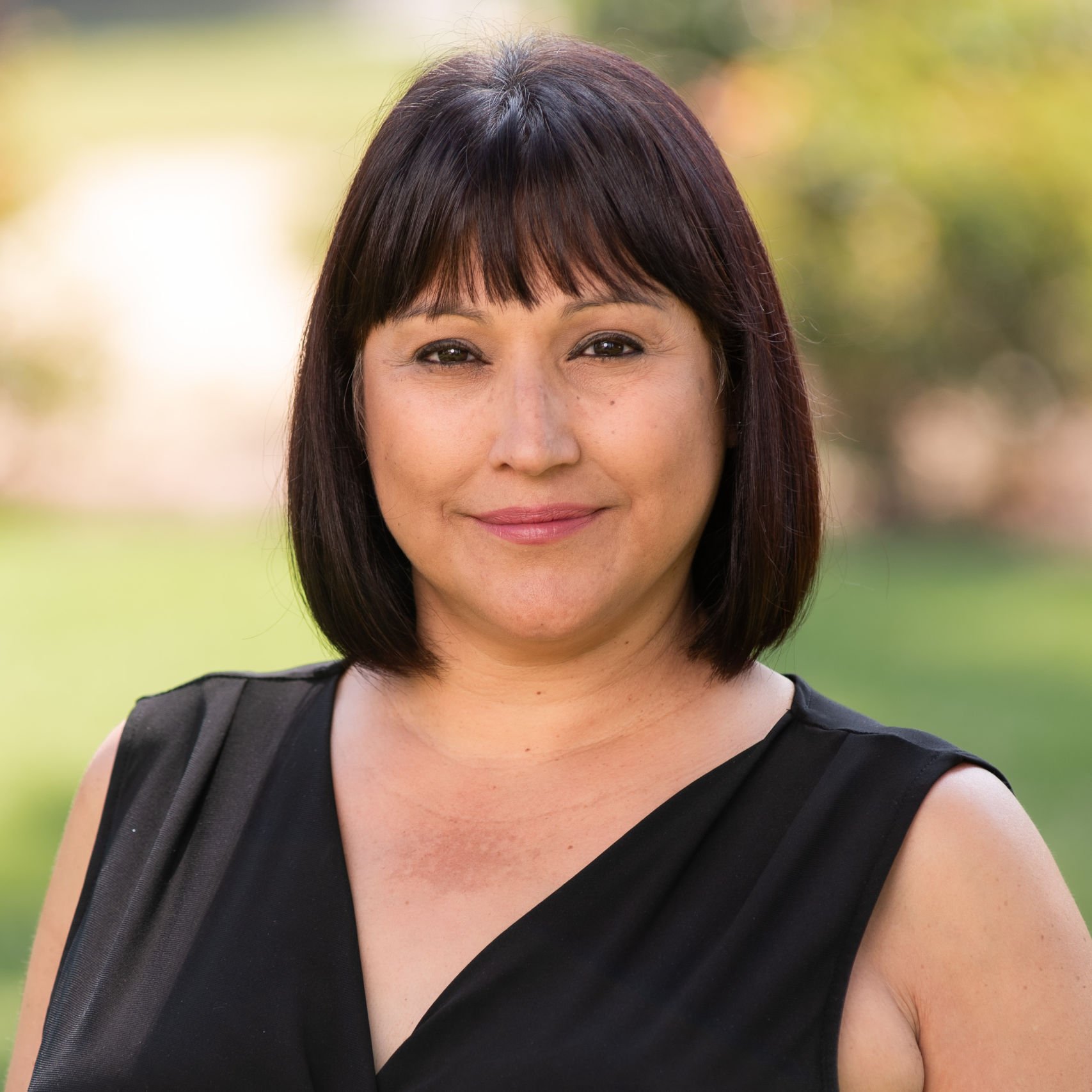 a woman in a black dress